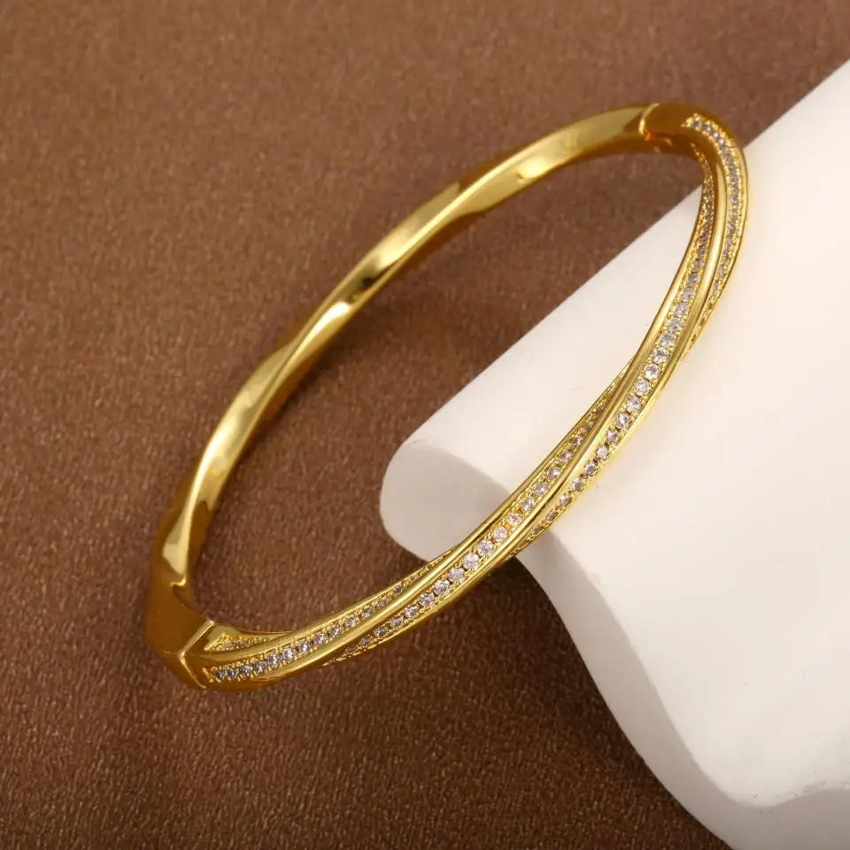 Elegant crystal bracelet with two rows of gold detailing. 0