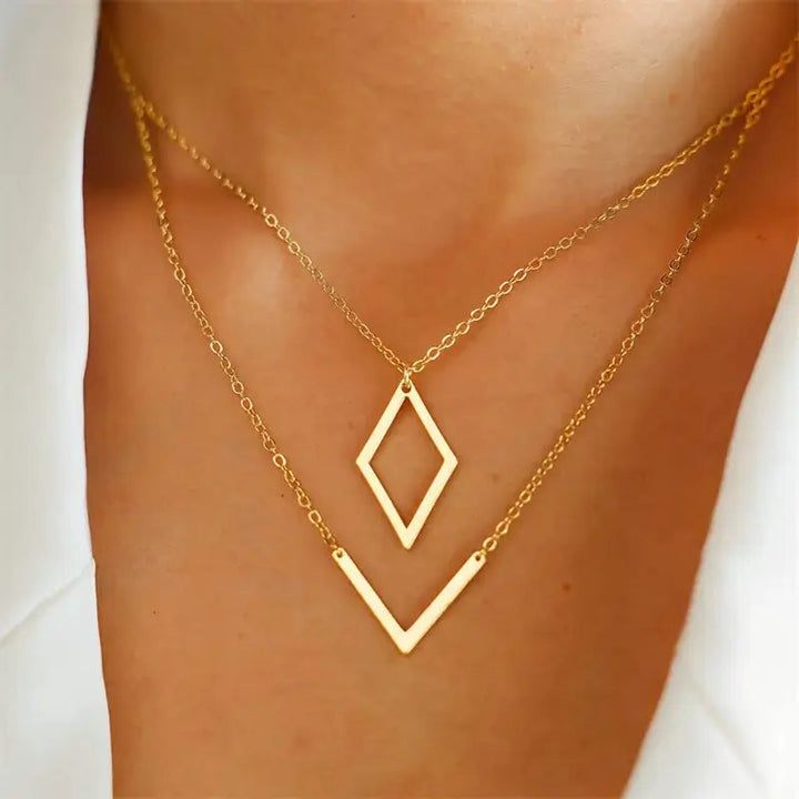 Elegant necklace with geometric V-shaped pendant. 0